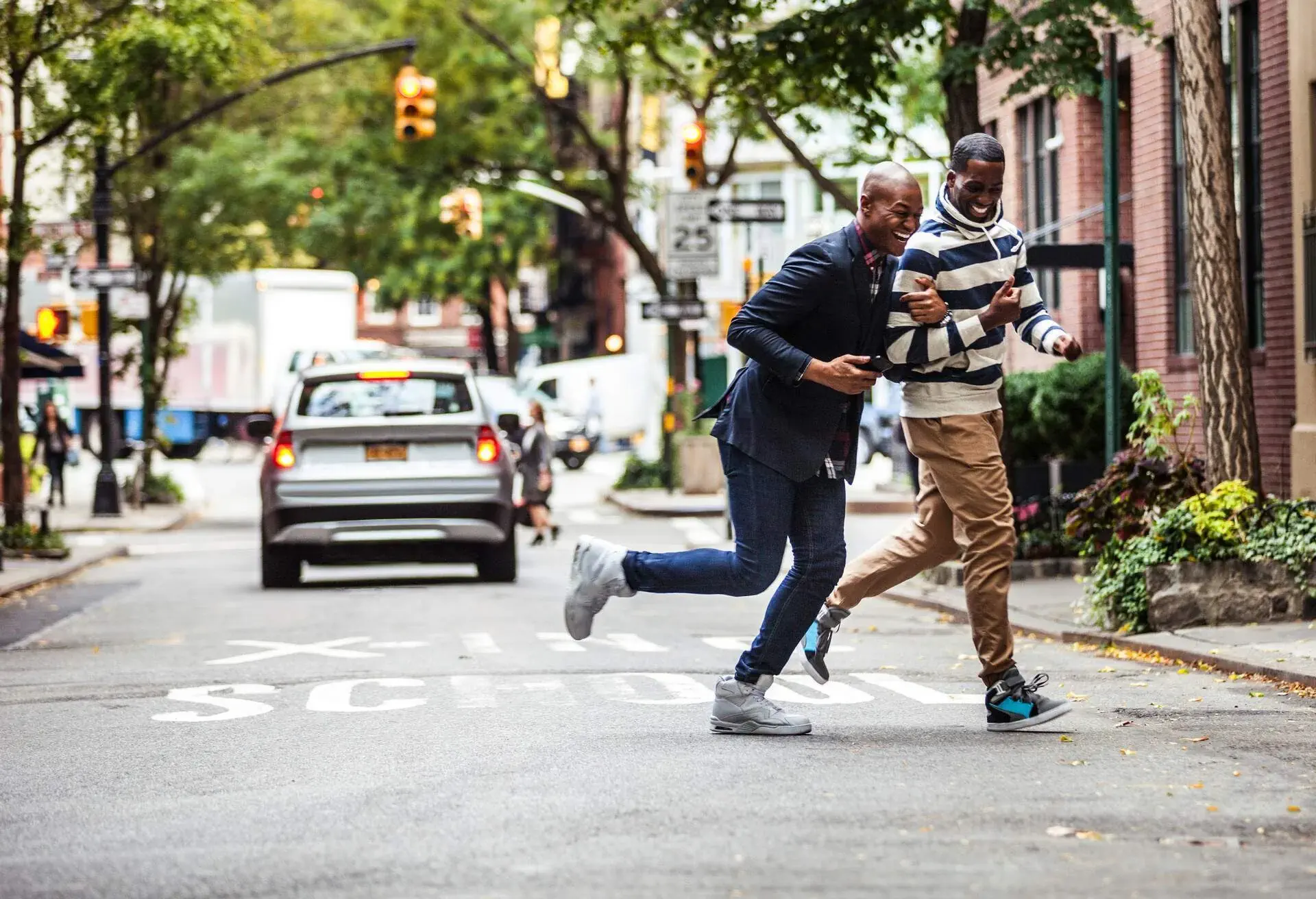 Same sex young couple hanging out and walking in Greenwich Village - New York, USA. 