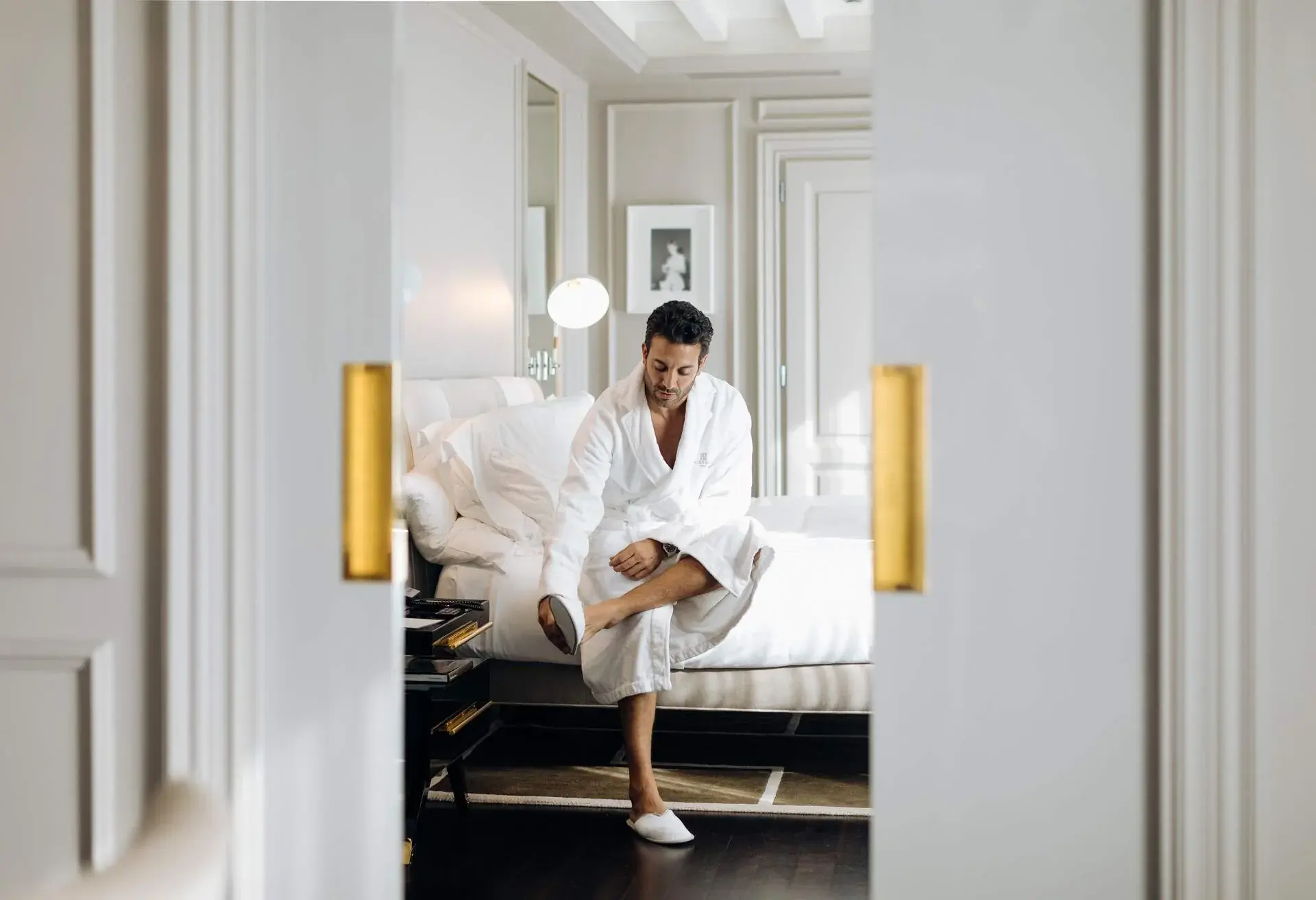 THEME_LUXURY_HOTEL_PEOPLE_MAN-IN-ROBE_GettyImages-1261589845