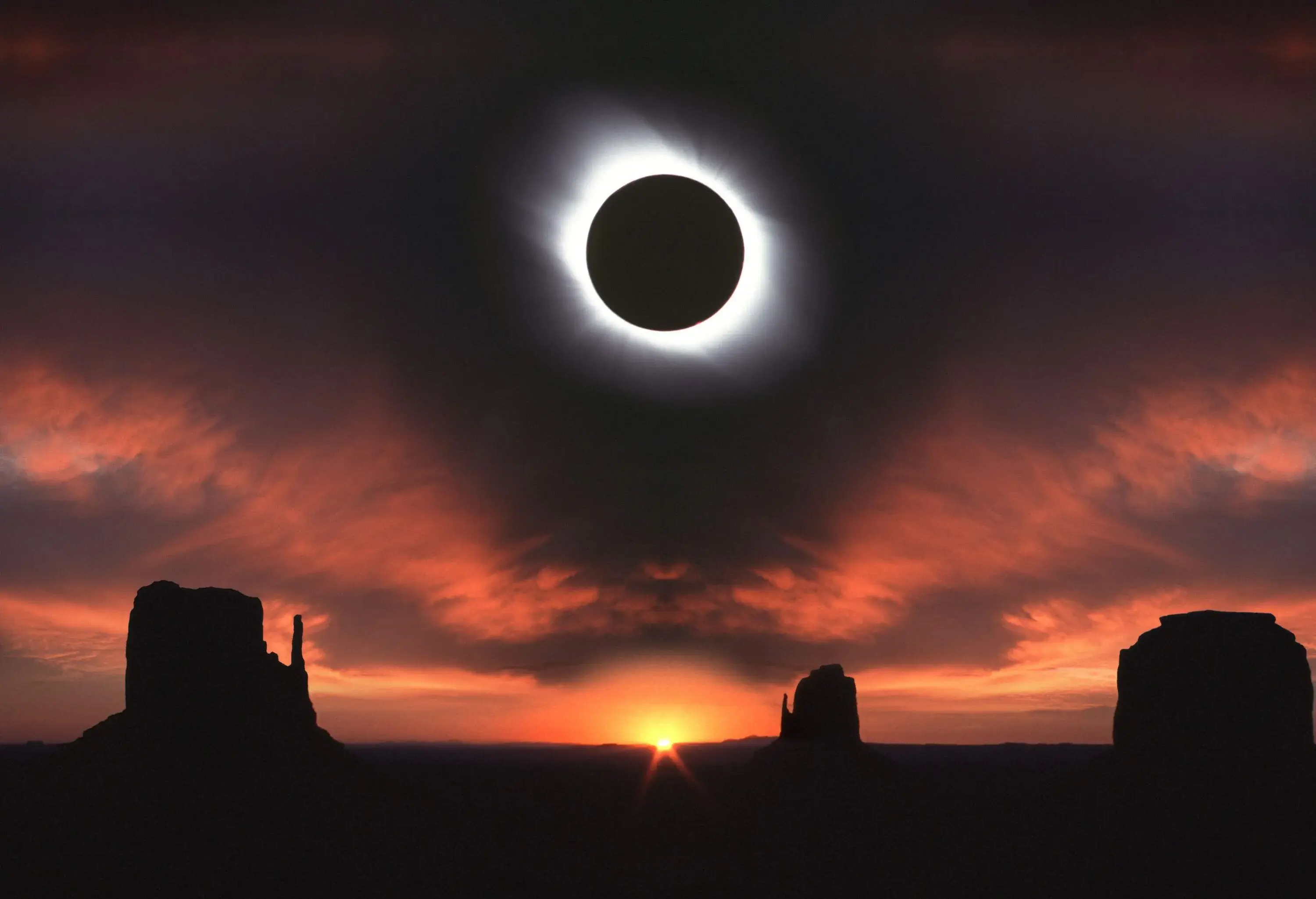 Dramatic sky during total solar eclipse over Monument Valley
